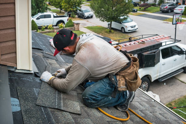 Professional Flat Roof Repair technician working in Carrolltown, PA
